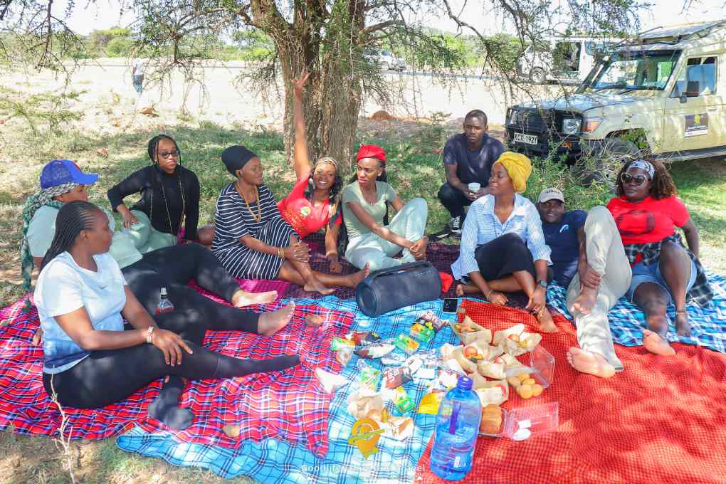 A group taking part in a facilitated team building activity in Kenya